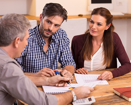 A client meeting with two attorneys