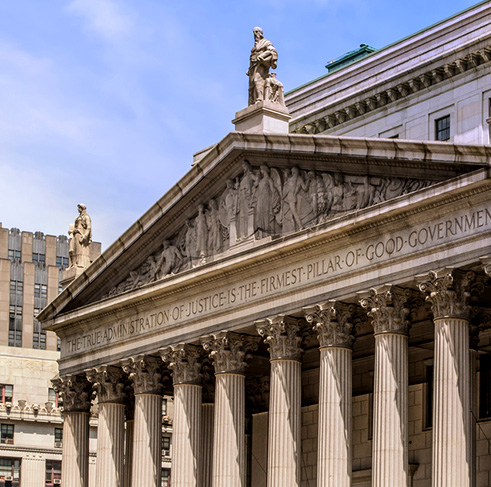 A courthouse with stone columns